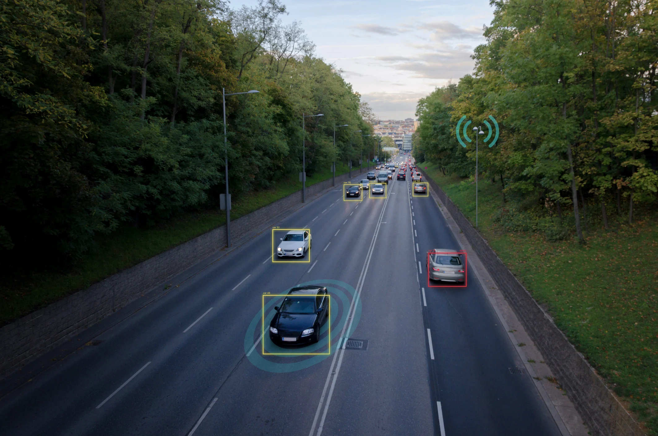Cars driving on a multi-lane road, with some vehicles highlighted by digital overlays from measurement technology. Cars driving on a multi-lane road, with some vehicles highlighted by digital overlays from measurement technology.